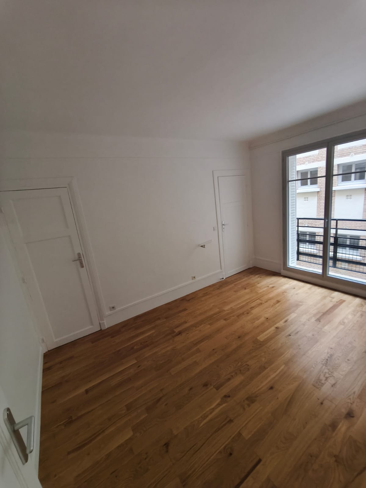 Sol après rénovation parquet en Île-de-France, résultat après ponçage, ragréage et pose de parquet